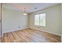 Simple dining room with light walls and wood-look floors at 607 Waterwood Dr, Goose Creek, SC 29445
