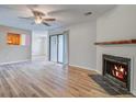 Spacious living room with fireplace and sliding glass door at 607 Waterwood Dr, Goose Creek, SC 29445