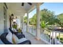 Spacious front porch with comfortable seating and lovely view at 738 Hibbens Grant Blvd, Mount Pleasant, SC 29464