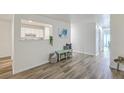 Bright and airy entry hall with wood-look floors at 202 Greenmeadow Dr, Goose Creek, SC 29445