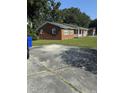 Spacious concrete driveway providing ample parking space at 8520 Delhi Rd, North Charleston, SC 29406