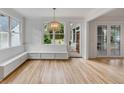 Bright breakfast nook with built-in bench seating at 517 Royall Ave, Mount Pleasant, SC 29464