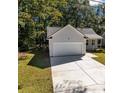 New construction home with gray siding, white trim, and a one-car garage at 168 Aleene Dr, Summerville, SC 29485
