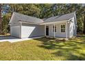 New construction home with gray siding, white trim, and a one-car garage at 168 Aleene Dr, Summerville, SC 29485