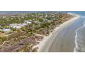 Aerial view of beachfront homes and landscape at 1735 Atlantic Ave, Sullivans Island, SC 29482