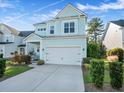 Two-story light blue house with a two-car garage at 2902 Clearwater Dr, Mount Pleasant, SC 29466