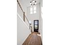 Spacious entryway with hardwood floors, a black front door, and natural light at 175 Cantona Dr, Summerville, SC 29483