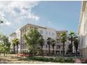 Building with balconies, walkways, palm trees, and manicured landscaping at 325 Longshore St # 1123, Daniel Island, SC 29492