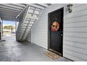 Private apartment entrance with exterior stairs at 21 Rivers Point Row # 4B, Charleston, SC 29412