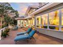 Multi-level deck with stunning sunset views and access to interior at 169 Marsh Island Dr, Kiawah Island, SC 29455