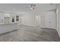 Open living room with kitchen island and grey flooring at 164 Aleene Drive Dr, Summerville, SC 29485