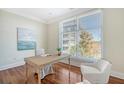 Home office featuring a large window and hardwood floors at 235 Cooper River Dr, Mount Pleasant, SC 29464