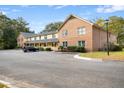 Brick building exterior with parking and landscaping at 2150 Spoleto Ln # H7, North Charleston, SC 29406