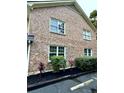 Brick building exterior with landscaping and windows at 2150 Spoleto Ln # H7, North Charleston, SC 29406