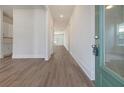 Bright entryway with green door and hardwood floors at 321 Trailmore Ln, Summerville, SC 29486