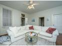 Relaxing living room with white sectional sofa and coffee table at 64 Radcliffe St, Charleston, SC 29403