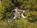 Bird's eye view of house, pool, and expansive lot at 102 Flud St, Summerville, SC 29483