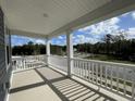 Porch overlooking community green space at 513 W Respite Ln, Summerville, SC 29483