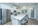 Modern kitchen with stainless steel appliances and white cabinets at 115 Claret Cup Way, Charleston, SC 29414