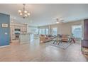 Open living room and kitchen with hardwood floors and neutral colors at 215 Firewheel Ct, Summerville, SC 29486