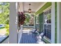 Relaxing front porch with decorative accents at 794 Hunt Club Run, Charleston, SC 29414