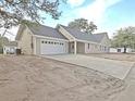 New construction home with attached garage and driveway at 4566 Durant Ave, North Charleston, SC 29405