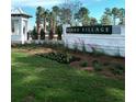 Welcoming entrance to Wando Village with landscaping and signage at 368 Blowing Fresh Dr, Charleston, SC 29492