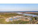 Aerial view of a waterfront community with a central lake at 3885 Summerton St, Mount Pleasant, SC 29466