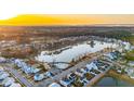 Aerial view of a charming neighborhood with a lake at 3890 Summerton St, Mount Pleasant, SC 29466