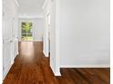 Bright hallway with hardwood floors and doors at 180 Cherry Grove Dr, Summerville, SC 29483