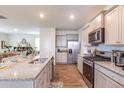 Modern kitchen featuring stainless steel appliances and granite countertops at 190 E Pinckney St, Lincolnville, SC 29485