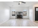 Modern marble fireplace in a bright living room at 255 Pine Shadow Dr, Goose Creek, SC 29445