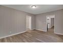 Spacious living area with light gray walls and wood floors at 2674 Houston St, North Charleston, SC 29405