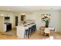 Modern kitchen with white cabinets, quartz countertops, and stainless steel appliances at 2026 Culver Ave, Charleston, SC 29407