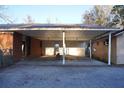 Covered carport with attached storage area at 150 M L King Blvd, Saint Stephen, SC 29479