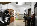 Organized garage with workbench and ample storage at 476 Rockville Rd, Moncks Corner, SC 29461
