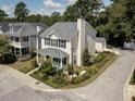 Two-story house with landscaped yard and detached garage at 1751 Bee Balm Rd Rd, Johns Island, SC 29455