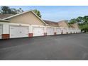 Attached garages with white doors in a row at 1012 Basildon Rd, Mount Pleasant, SC 29466