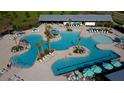 Aerial view of resort-style pool with lounge chairs and umbrellas at 322 Trailmore Ln, Summerville, SC 29486
