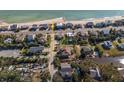 Aerial view of beach neighborhood with oceanfront home sites at 202 Mary St, Edisto Island, SC 29438