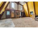 Spacious living room with high ceilings, fireplace, and wood beams at 1269 College Park Rd, Summerville, SC 29486