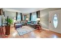 Cozy living room with hardwood floors and comfy seating at 1407 Fairfield Ave, Charleston, SC 29407