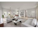Open concept living and dining area with modern kitchen at 5748 Pilgrim Ave # D, Hanahan, SC 29410