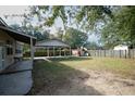 Large backyard with covered patio and shed at 1393 Secessionville Rd, Charleston, SC 29412