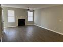 Bright living room featuring a fireplace and neutral walls at 163 Pine Shadow Dr, Goose Creek, SC 29445