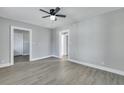 Spacious living room featuring hardwood floors and ceiling fan at 2671 Olympia Ave, North Charleston, SC 29405