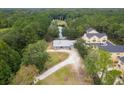 Aerial view showing home's location, pond, and surrounding community at 3034 Cane Slash Rd, Johns Island, SC 29455