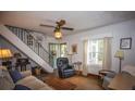 Cozy living room featuring hardwood floors and a comfortable seating area at 434 Riverland Dr, Charleston, SC 29412