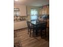 Eat-in kitchen with light wood cabinets and tile floor at 4450 Hardwood St, Ladson, SC 29456