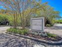 The Arboretum community entrance sign with landscaping at 2244 Ashley Crossing Dr # 214, Charleston, SC 29414